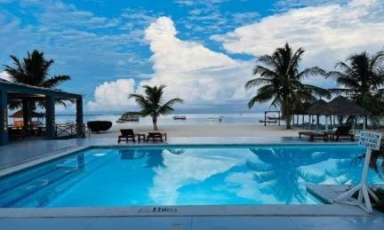 Beach resort pool facing the ocean